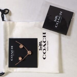 Coach Rose gold necklace and earrings set
